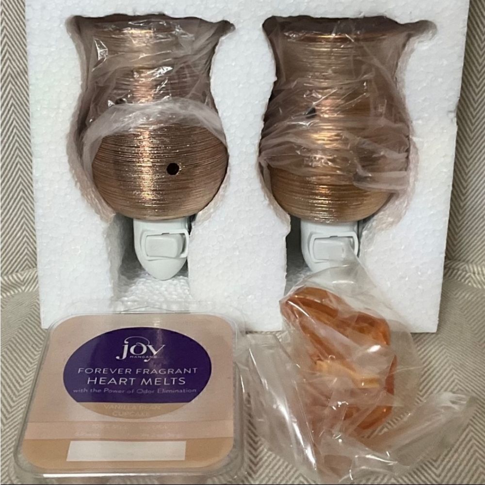 Joy Mangano Forever Fragrant wax warmers with  vanilla bean  heart melts